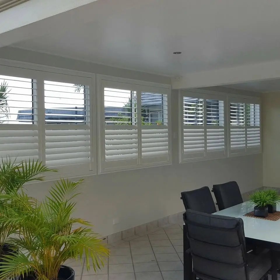 Plantation shutters installed on a Gold Coast outdoor patio